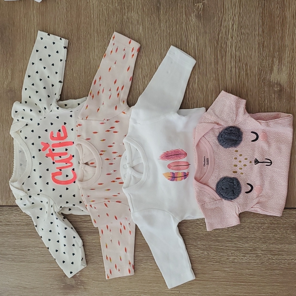 Assortment of onesies 0-3 month